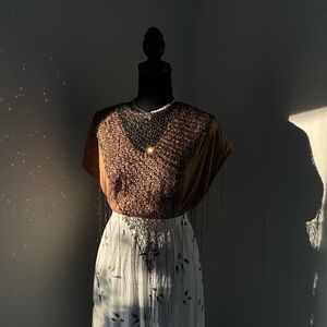 Elegant Brown and White Scarf by [Brand]